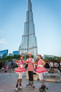 Servers on roller-skates at the Dubai Opera House event by Loesje Kessels Fashion Photographer