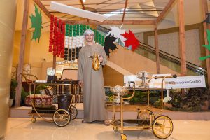 Coffee boy at Emaar's Address Dubai Mall by Loesje Kessels Fashion Photographer
